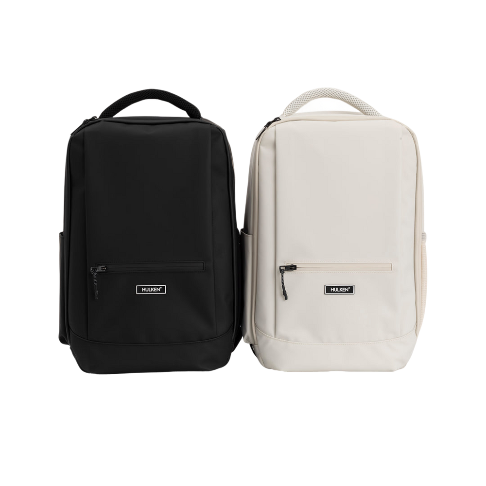 Black and beige backpacks side by side 