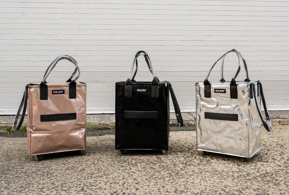 Hulken tote bag in black, silver, and rose gold side by side.