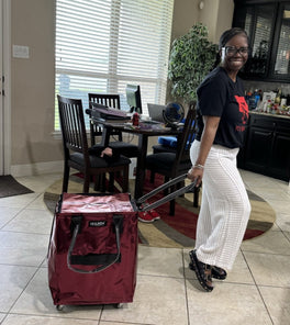 A lady with a cosmic red tote